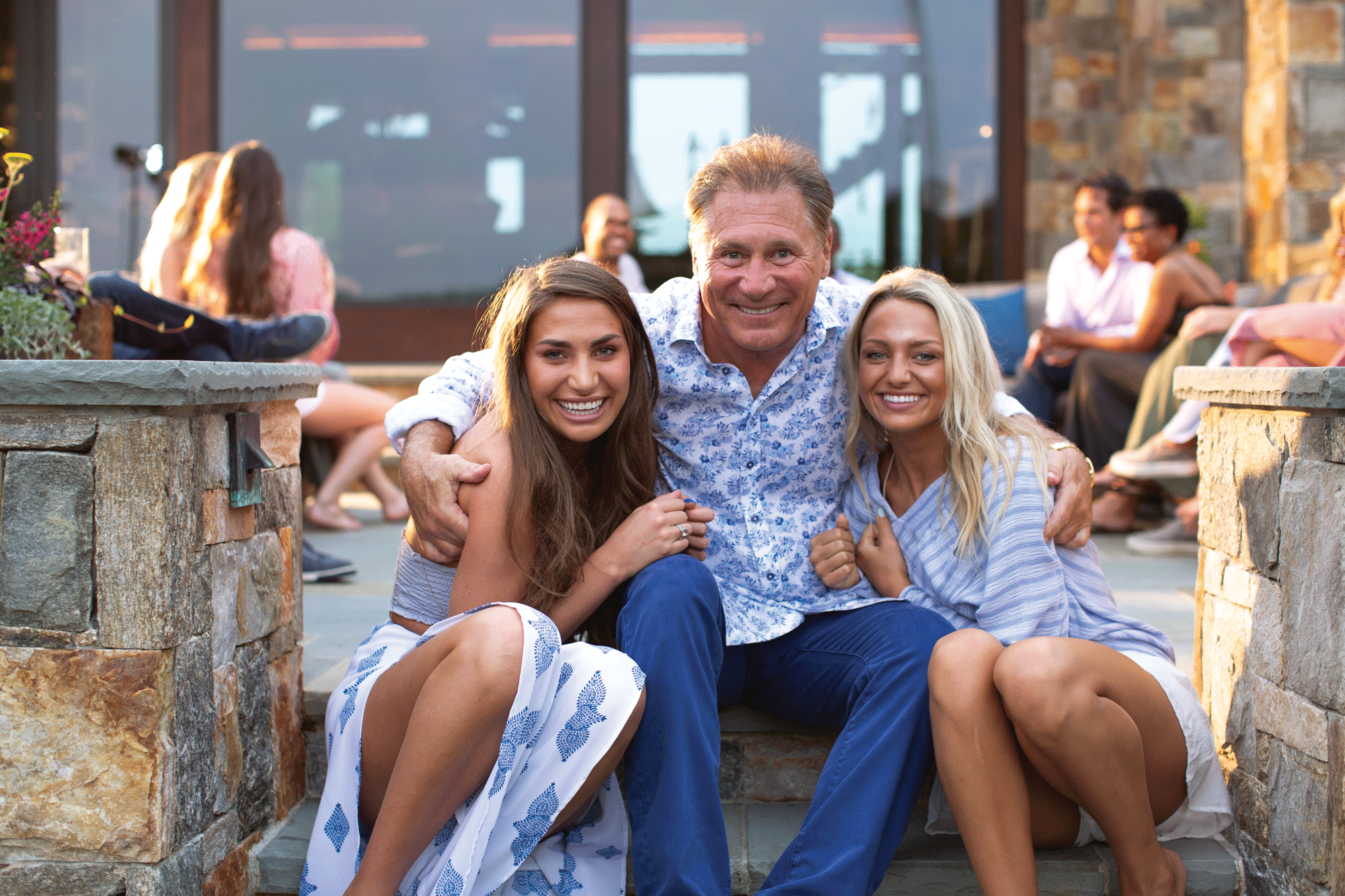 Dr.A with his girls on the steps outside his home